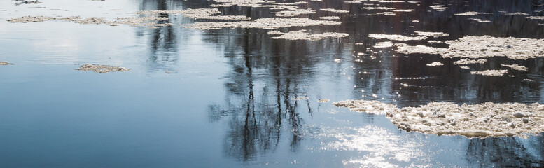 Spring ice melting on the river