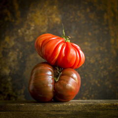 Closeup shot of tomatoes one on another