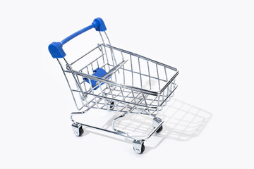 Empty shopping cart isolated on white background