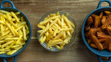 comparison of three servings of fries. Semi-finished product from the store. Handmade at home. Bought at McDonald's.
