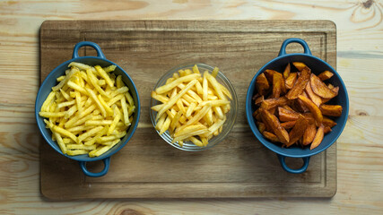 comparison of three servings of fries. Semi-finished product from the store. Handmade at home. Bought at McDonald's.