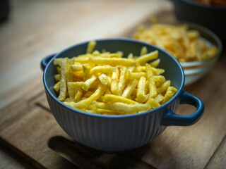 comparison of three servings of fries. Semi-finished product from the store. Handmade at home. Bought at McDonald's.