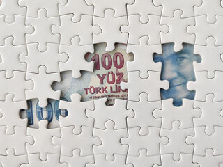 Obraz premium White jigsaw puzzle with Turkish lira