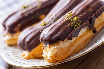Traditional french eclairs with chocolate.