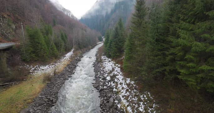 Mountain river with large stones in the mountains, aerial view. 