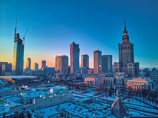 Beautiful panoramic aerial drone view on Warsaw City Skyscrapers, PKiN, and Varso Tower under...