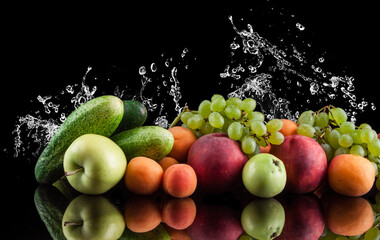 Fototapeta na wymiar water splash fruits and vegetables on a black background, apple, cucumber, apricot, grapes, zucchini, peaches