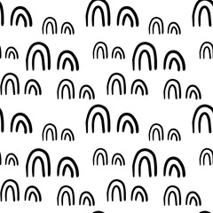 Cute hand drawn doodle shapes seamless pattern. Messy texture of different arches, rainbows.