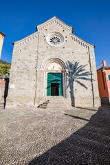 Naklejka premium View of facade exterior of the Sant Pietro church in Vernazza village in Cinque Terre on the Italian Riviera