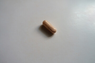 Pink vegetarian capsule of probiotics dietary supplement