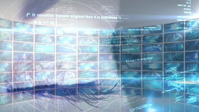 Animation of a human eye with data and information moving over multiple screens