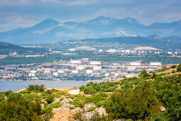 Naklejka na ściany i meble Oil refinery near Rijeka, Croatia. Summer landscape and industrial panoramic view