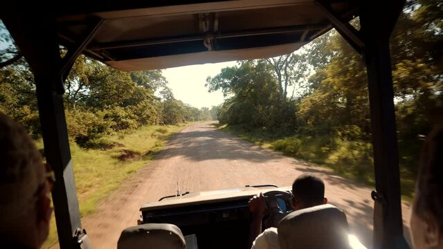 Woman On Africa River Safari Adventure.Safari Trip On Tanzania Selous.Tourist In Hat On African Safari Adventure On Holiday Vacation.Wild Nature Of Search Lions And Giraffe Serengeti Or Ngorongoro.