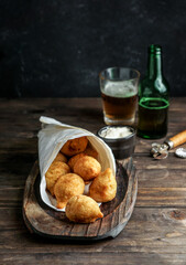 coxinha - popular food in Brazil consisting of chopped or shredded chicken meat covered in dough