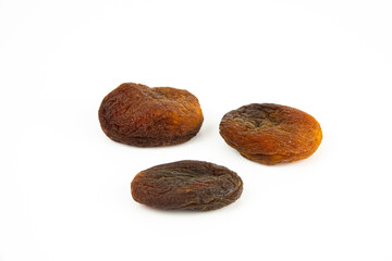 Naturally sun dried apricots isolated on white background.