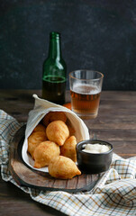 coxinha - popular food in Brazil consisting of chopped or shredded chicken meat covered in dough