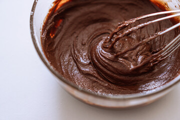 Fudge and Dense Chocolate Cocoa Nutella  Brownie preparing in a mixing bowl with Stainless Balloon Whisk, Cream Whisk, Egg-beater