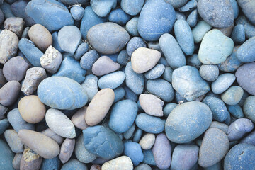 Fototapeta na wymiar Pebbles stone or river stone background with vintage filter 