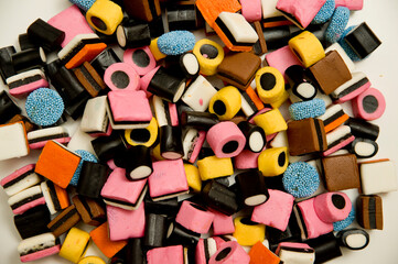 Sweet gummies, licorice gums, candies for kids and grown-ups .