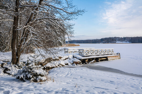 View of the wooden pier and coast in winter, Dagmar park, Kallviken, Raseborg, Finland
