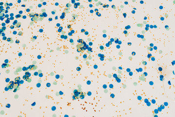 Bright colorful confetti isolated on white background.