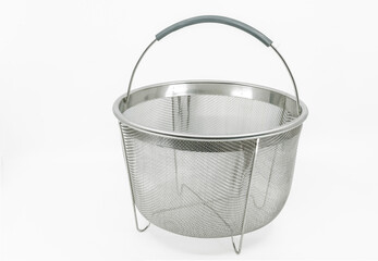 Isolated modern mesh basket on white background, empty stainless steel mesh basket with handle.