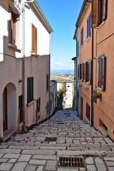 A narrow street in Nusco, a medieval village in the province of Avellino, Italy.