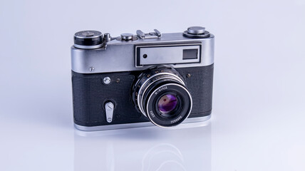 old soviet camera with flash on white background