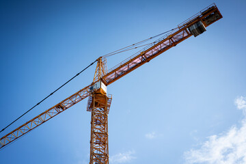 construction crane against blue sky