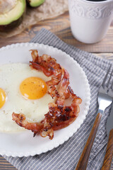 Breakfast with fried eggs and bacon