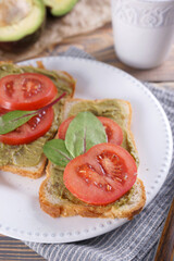 Breakfast with sandwiches with guacamole sauce