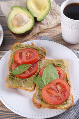 Breakfast with sandwiches with guacamole sauce