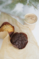 Chocolate and vanilla muffins in paper wrapper