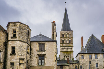 Obraz premium View on the bell tower of Notre Dame church, in the cluniac priory of La Charité sur Loire, located in Burgundy, France