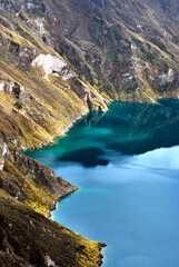 View of a water-filled crater lake and the most western volcano in the Ecuadorian Andes