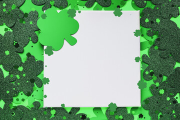 Happy St Patrick's day. Blank canvas over a green background with clover.