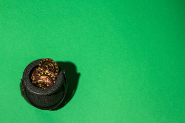 St Patrick's Day Pot of Gold and over a green background