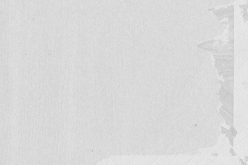 Cardboard gray texture close-up. Light old paper background. Grunge concrete wall. Vintage blank wallpaper.