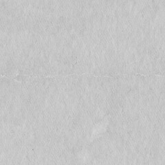 Cardboard gray texture close-up. Light old paper background. Grunge concrete wall. Vintage blank wallpaper.