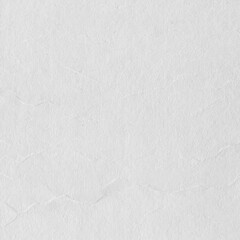 Cardboard gray texture close-up. Light old paper background. Grunge concrete wall. Vintage blank wallpaper.