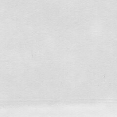 Fototapeta premium Cardboard gray texture close-up. Light old paper background. Grunge concrete wall. Vintage blank wallpaper.