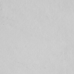 Cardboard gray texture close-up. Light old paper background. Grunge concrete wall. Vintage blank wallpaper.