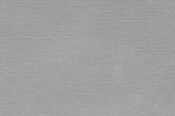 Cardboard gray texture close-up. Light old paper background. Grunge concrete wall. Vintage blank wallpaper.