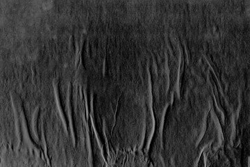 Cardboard gray texture close-up. Light old paper background. Grunge concrete wall. Vintage blank wallpaper.