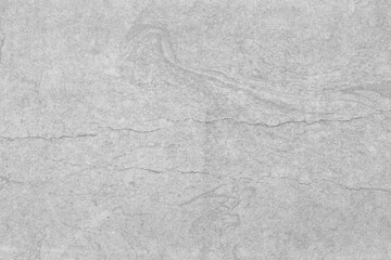 Naklejka premium Cardboard gray texture close-up. Light old paper background. Grunge concrete wall. Vintage blank wallpaper.