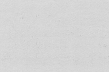 Cardboard gray texture close-up. Light old paper background. Grunge concrete wall. Vintage blank wallpaper.