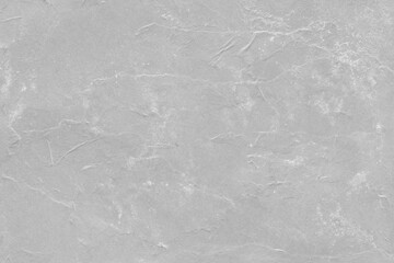 Cardboard gray texture close-up. Light old paper background. Grunge concrete wall. Vintage blank wallpaper.