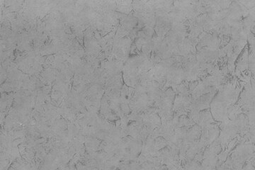 Cardboard gray texture close-up. Light old paper background. Grunge concrete wall. Vintage blank wallpaper.