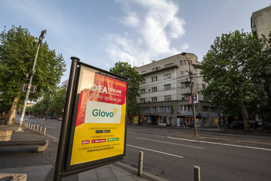 BELGRADE, SERBIA - MAY 14, 2019: Glovo logo on an Ad promoting in house delivery from Idea supermarkets in Belgrade. Glovo is a Spanish Food delivery app spread in Europe