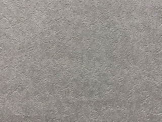 
Textured gray biton looks like wallpaper